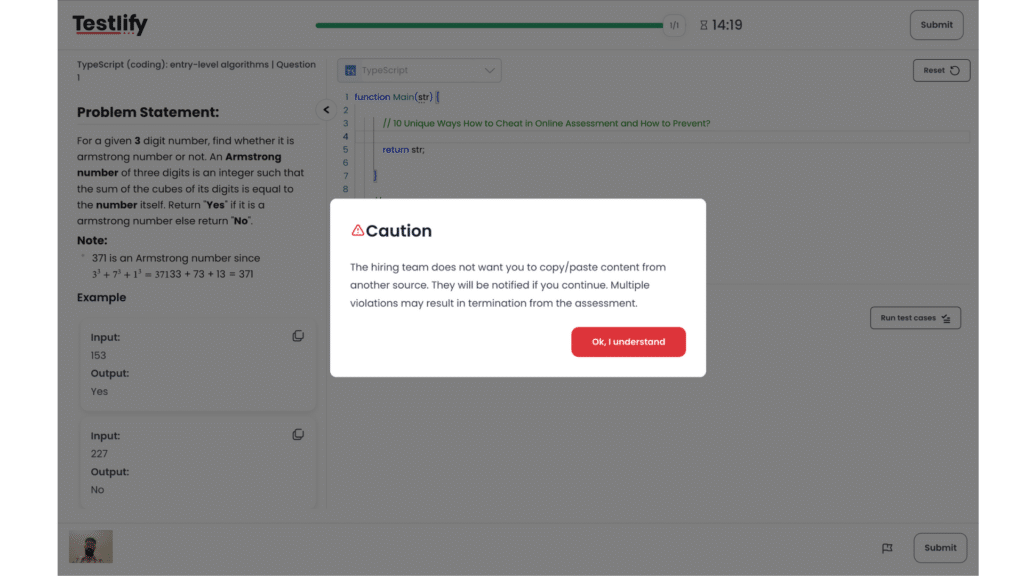 Image showing copy-paste violation warning in Testlify  during a proctored coding assessment.